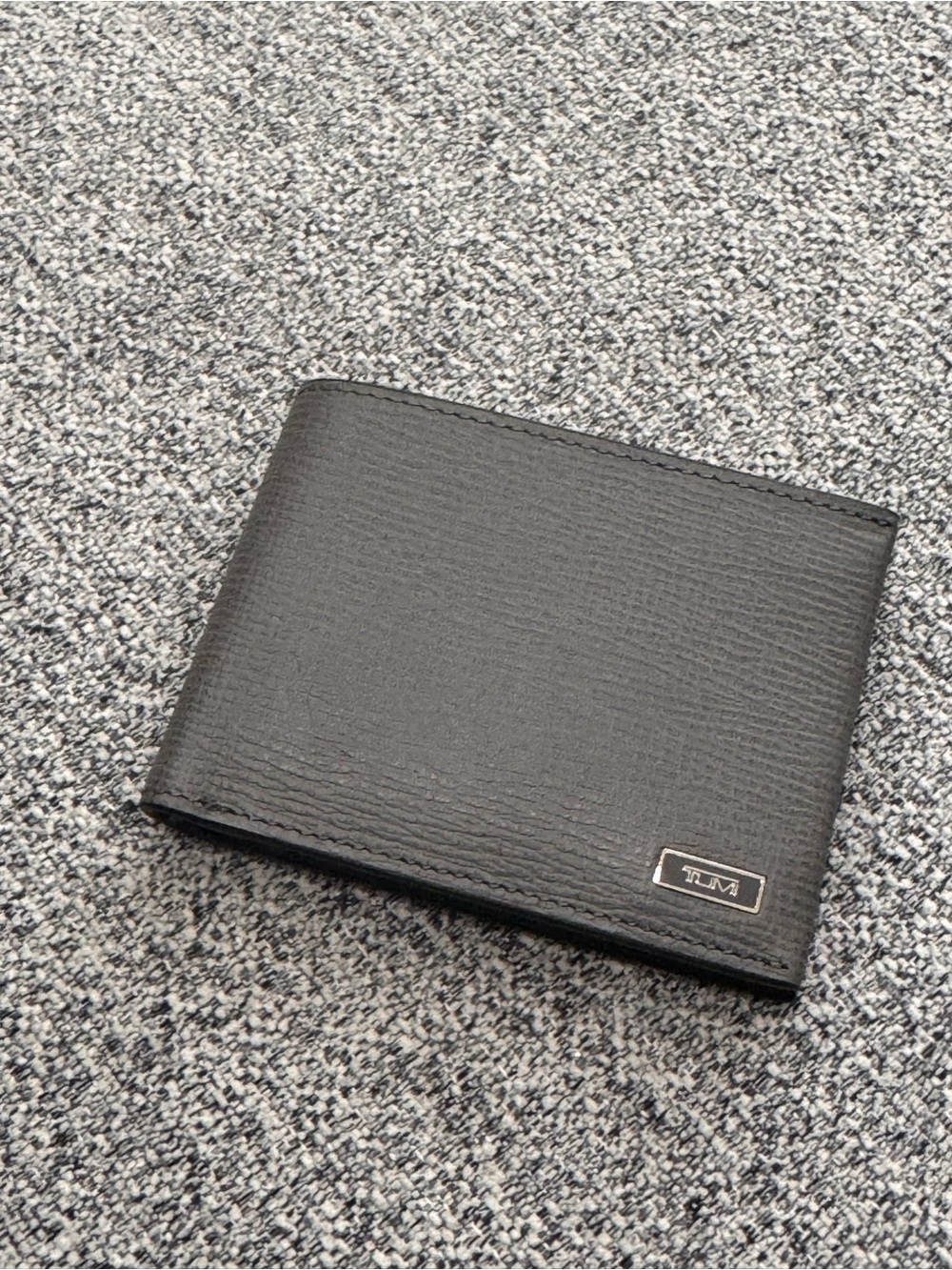 Tumi Gray Leather Bi-Fold Wallet with Metal Logo